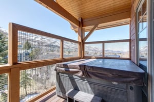 The private hot tub located on the private deck.