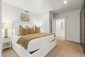 The third bedroom has a king size bed.