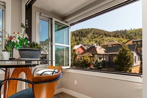 Accordion windows open entirely to let in a nice mountain breeze.
