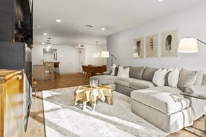 The Rio Grande 203 living room has a large sectional sofa and stylish furnishings.