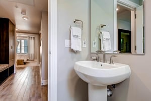 The half bathroom in the hallway.