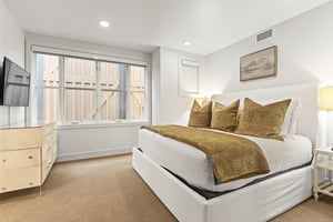 The third bedroom has a king size bed.