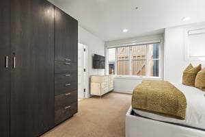 The third bedroom has a king size bed and large wardrobe closet.