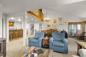 Snowflower 41 offers a spacious living area with two club chairs.