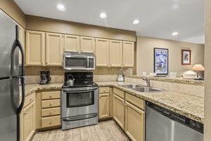 Snow Flower 144 has a wellequipped kitchen with stainless steel appliances.