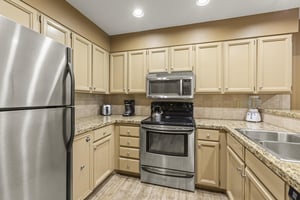 Snow Flower 144 has a wellequipped kitchen with stainless steel appliances.