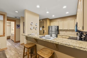 The breakfast bar with seating for two guests.