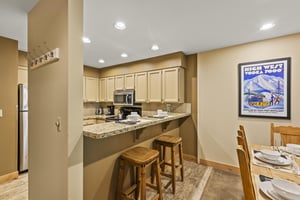 The breakfast bar with seating for two guests.