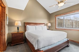 The main suite has a kingsize bed and well appointed furniture.