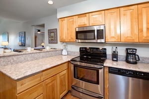 Snow Flower 28 has a wellequipped kitchen with stainless steel appliances.