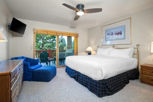 The main suite has a king size bed and private patio access.