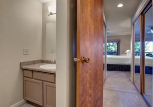 The en suite bathroom and one of two sinks.