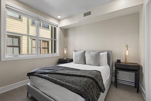 The second bedroom with a queen size bed.