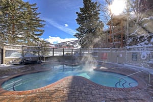 The Snow Flower heated soaking pool 1 and hot tub.