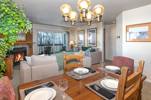 The dining table offers seating for four guests.