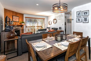 The open concept dining table with seating for 6 guests.