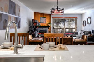 The kitchen offers a breakfast bar with seating for two guests.