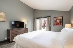Main bedroom with adjacent patio