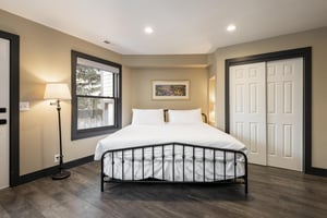 Lush king bed on the first level