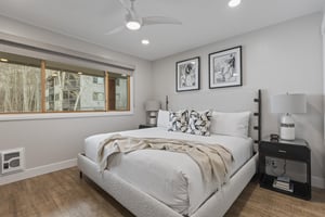 The second bedroom has a king size bed and stylish furnishings.