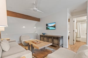 The loft offers another living area to play games or watch a show on the flat screen TV.