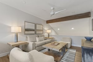 The loft offers another living area to play games or watch a show on the flat screen TV.
