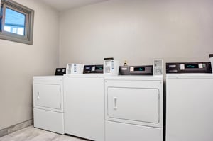 Common laundry room located on the second  third floors. Machines accept both coin payment and credit card via smartphone app