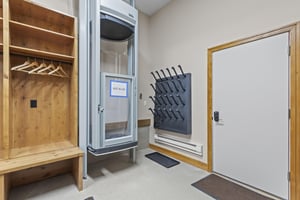 The mud room accessed through the garage with ski gear storage and boot glove dryer.