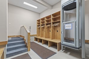 The mud room accessed through the garage with ski gear storage.