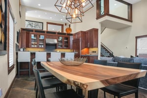 Vacation rental home offers dining table with open kitchen