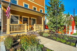 The Peak at Town Lifts entryway and garden.