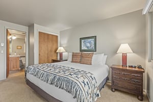 The main suite has a king size bed and comfortable furnishings.