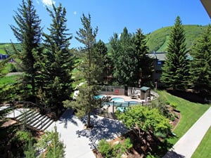 Snow Flower Condominiums Pool 2 in the summer time.