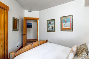 The second bedroom with queen size bed.