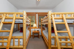 The third bedroom has two bunkbeds and sleeps 4.