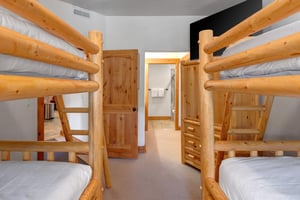 The third bedroom has two bunkbeds and sleeps 4.