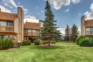 The exterior of the condo on the back side of the property.