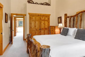 The main suite with a kingsize bed  and spacious closet.