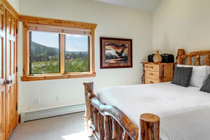 The third bathroom with a king size bed.