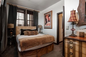 The third bedroom with a queen size bed.