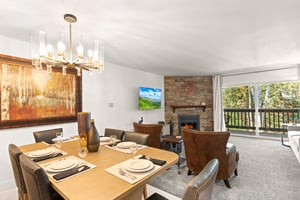 The open concept kitchen, dining room, and living room.