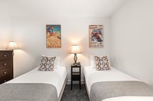 The second bedroom has two twin beds.