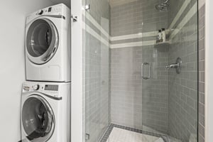 The shared bathroom has a walkin shower and a private washer and dryer.