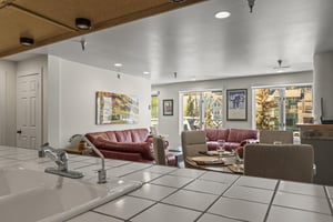 The kitchen overlooks the open concept area.