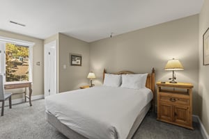 The main suite with a queen size bed.