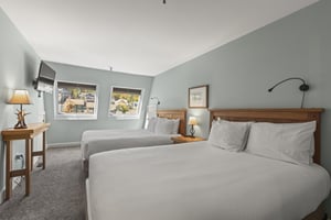 The second bedroom with two queen beds.