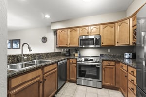 The wellequipped kitchen with stainless steel appliances.