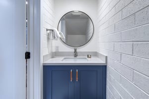 The convenient half bathroom off the living area.