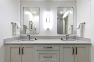 The en suite bathroom with two sink vanity.