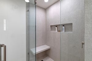 The en suite bathroom with a walkin shower.